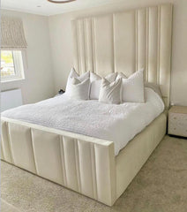 Luxurious crown bed exuding elegance and comfort, perfect for upscale bedroom decor and refined living.