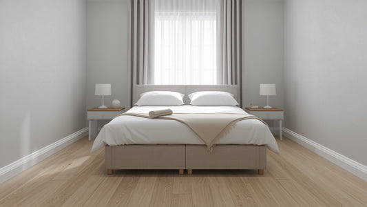 Neutral practical bedroom in a UK rental flat with a simple divan bed
