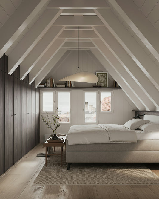 Spacious bedroom with a large king size bed